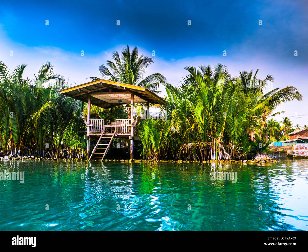 Stilt houses above river in rural Thailand Stock Photo Alamy