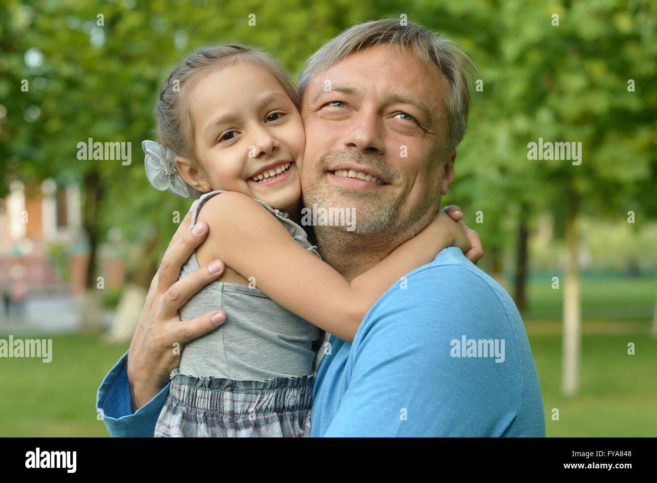 father with daughter in summer park Stock Photo - Alamy