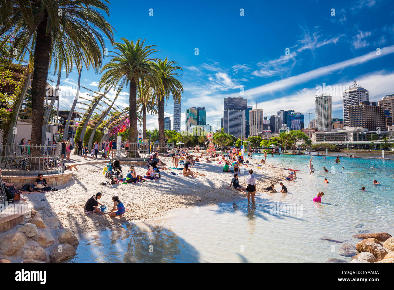 BRISBANE, AUS - APRIL 17 2016: Streets Beach in South Bank Parkland. It's inner-city man-made beach next to city center. Stock Photo