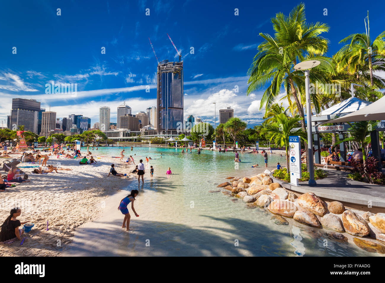 BRISBANE, AUS - APRIL 17 2016: Streets Beach in South Bank Parkland. It's inner-city man-made beach next to city center. Stock Photo