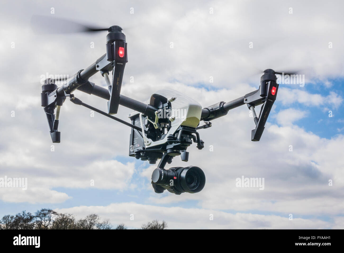 Remotely piloted DJI Inspire drone in flight Stock Photo