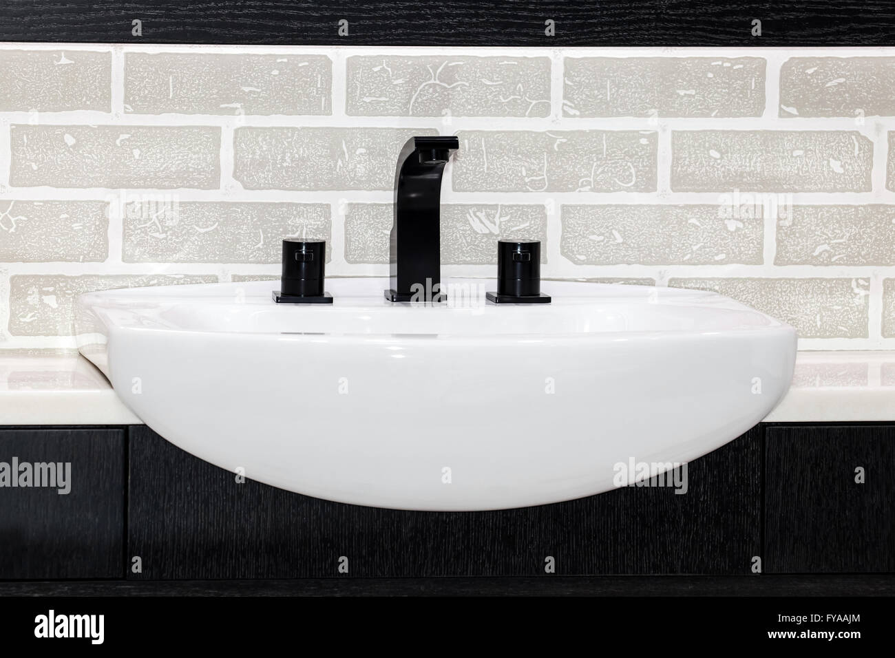 Modern black kitchen sink and faucet Stock Photo Alamy