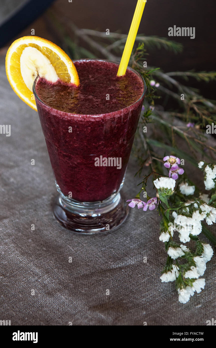 smoothie from blueberry banana and orange juice Stock Photo Alamy