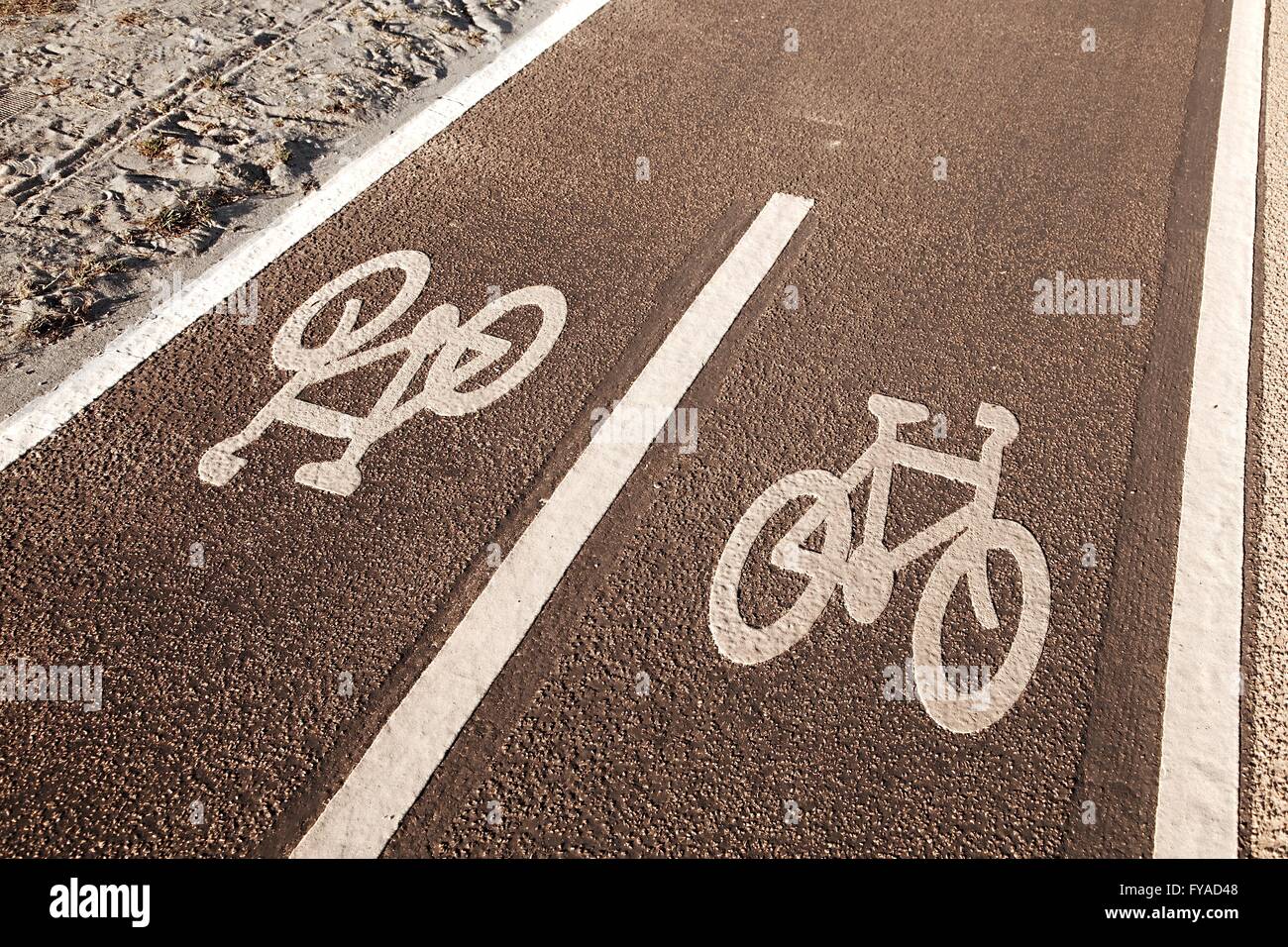 Bicycle lane signs Stock Photo - Alamy