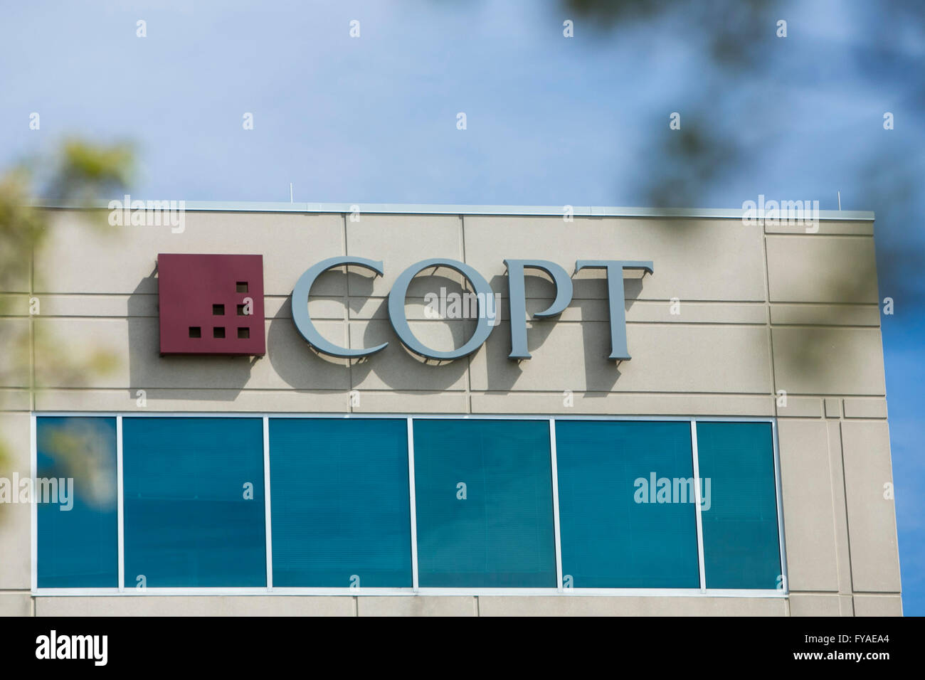 A logo sign outside of the headquarters of the Corporate Office