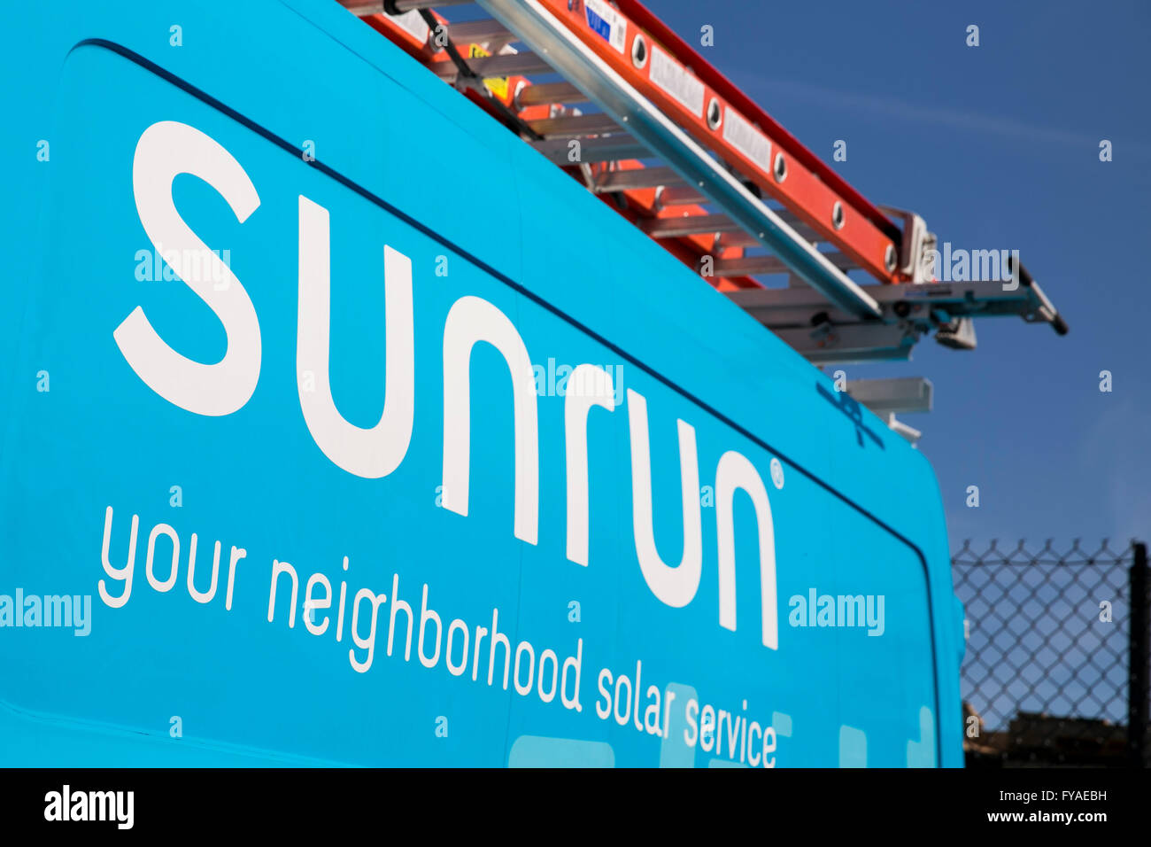 Work vans featuring logos of the solar provider Sunrun Inc., in Linthicum Heights, Maryland on April 10, 2016. Stock Photo