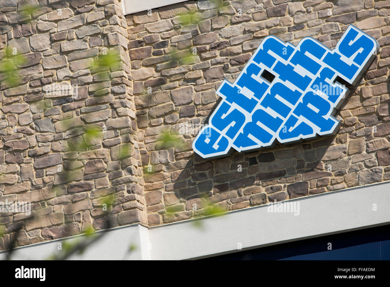 A logo sign outside of an Eastern Mountain Sports retail store in Dulles, Virginia on April 16, 2016. Stock Photo