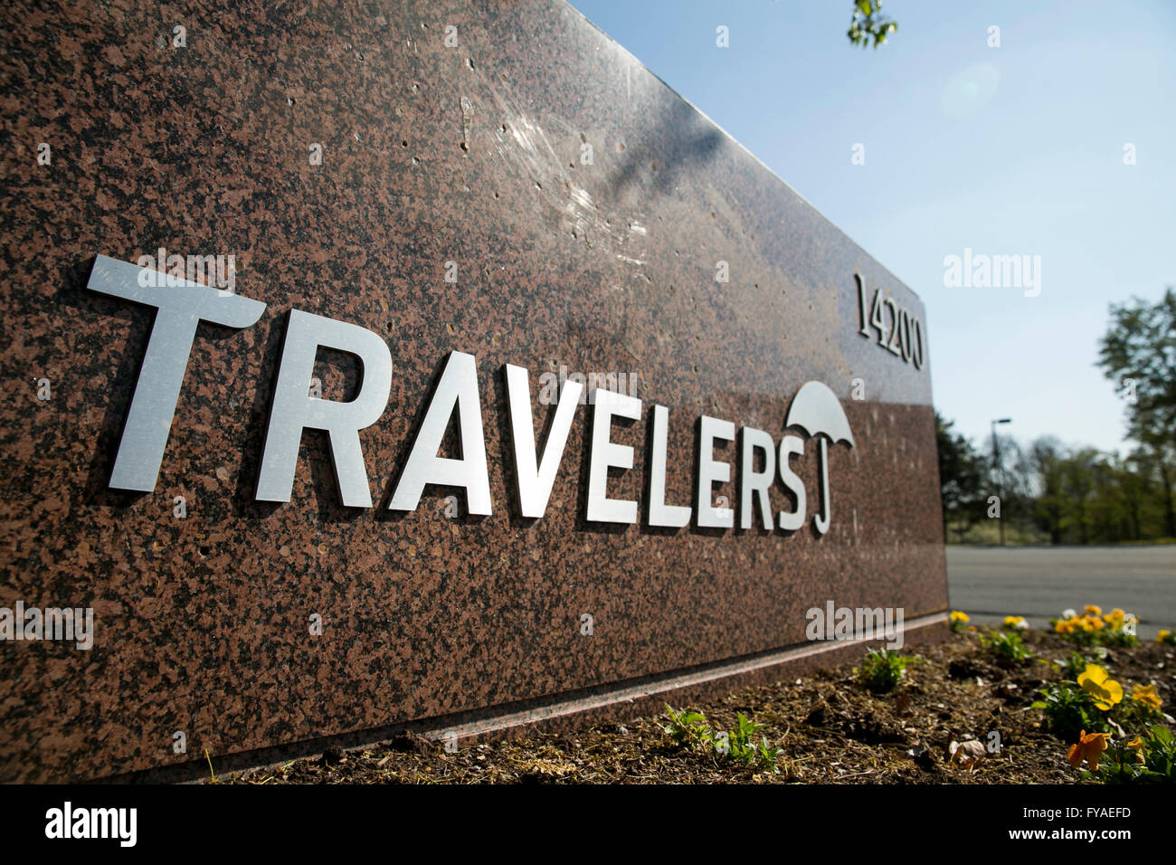 A logo sign outside of a facility occupied by The Travelers Companies