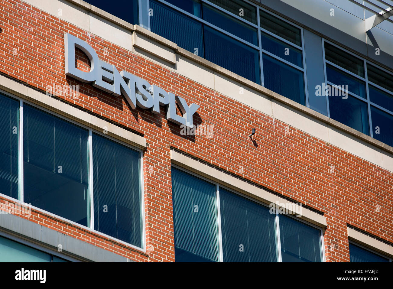 A logo sign outside of the headquarters of Dentsply Sirona in York