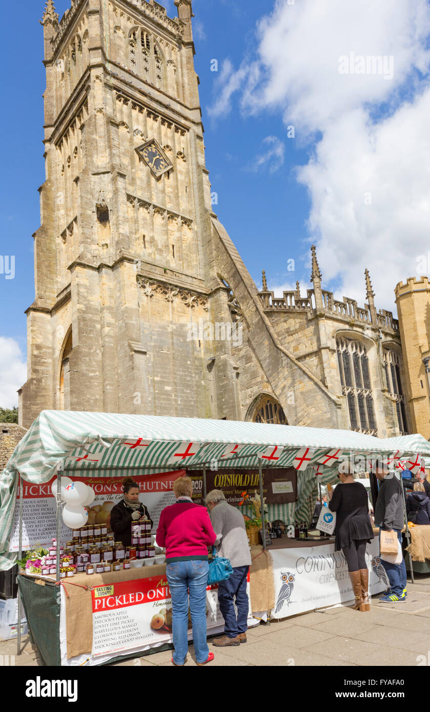 Market day and the Church of St. John the Baptist, Cirencester, Gloucestershire England, UK Stock Photo