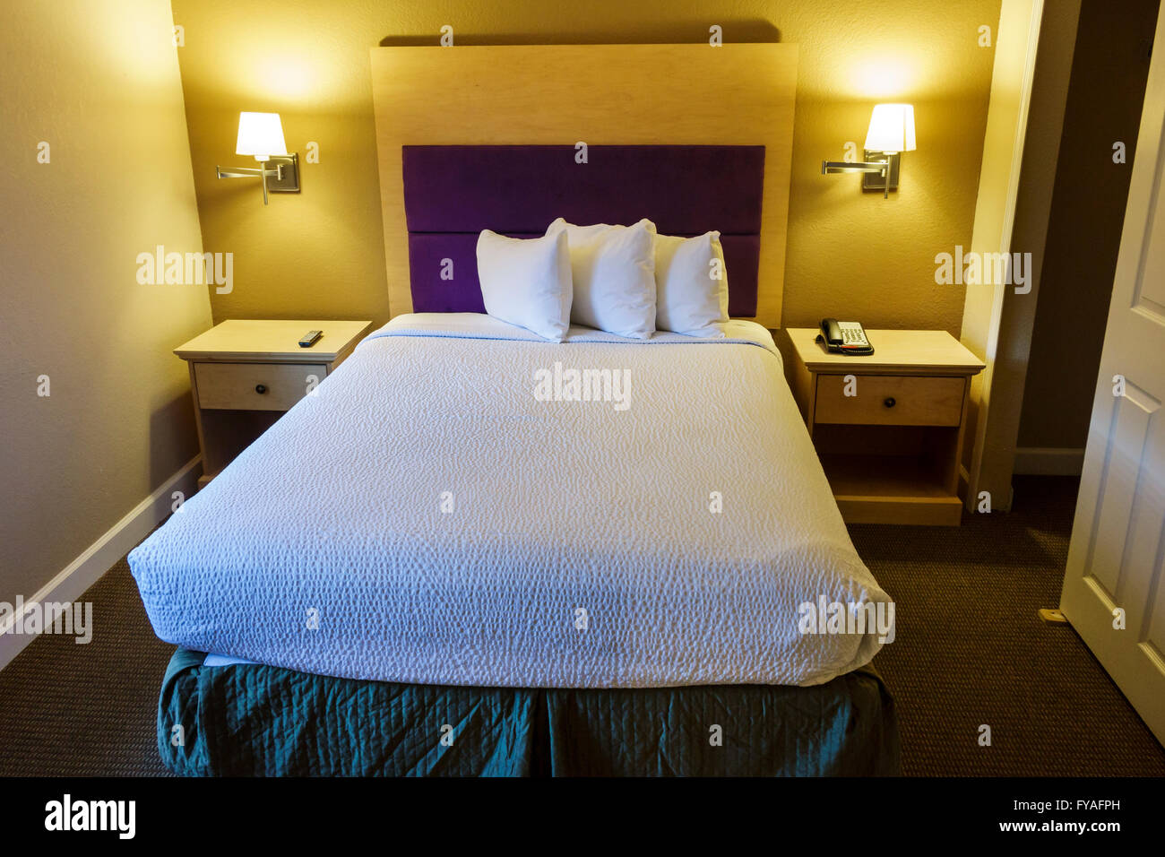 Florida Kissimmee,Orlando,Legacy Vacation Club,timeshare unit suite,resort,interior inside,bedroom,bed,made,pillows,FL160401032 Stock Photo