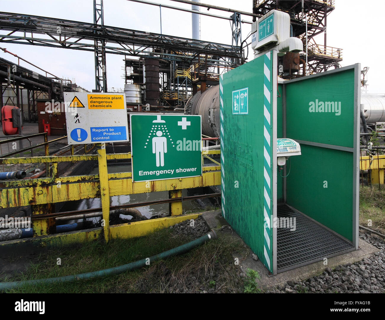 Industrial safety shower unit on chemical plant. Stock Photo