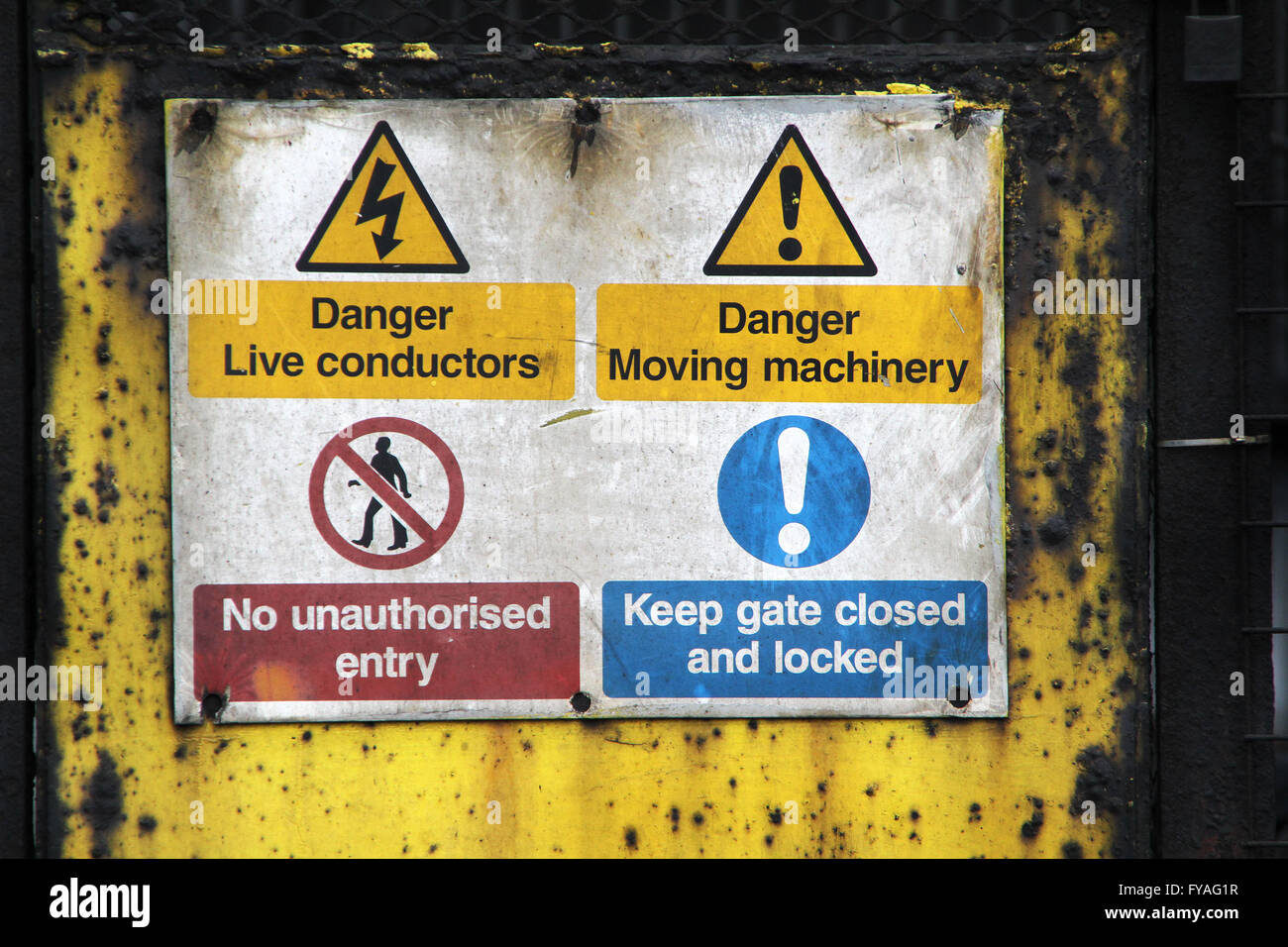 Danger signs on heavy industrial plant. Stock Photo