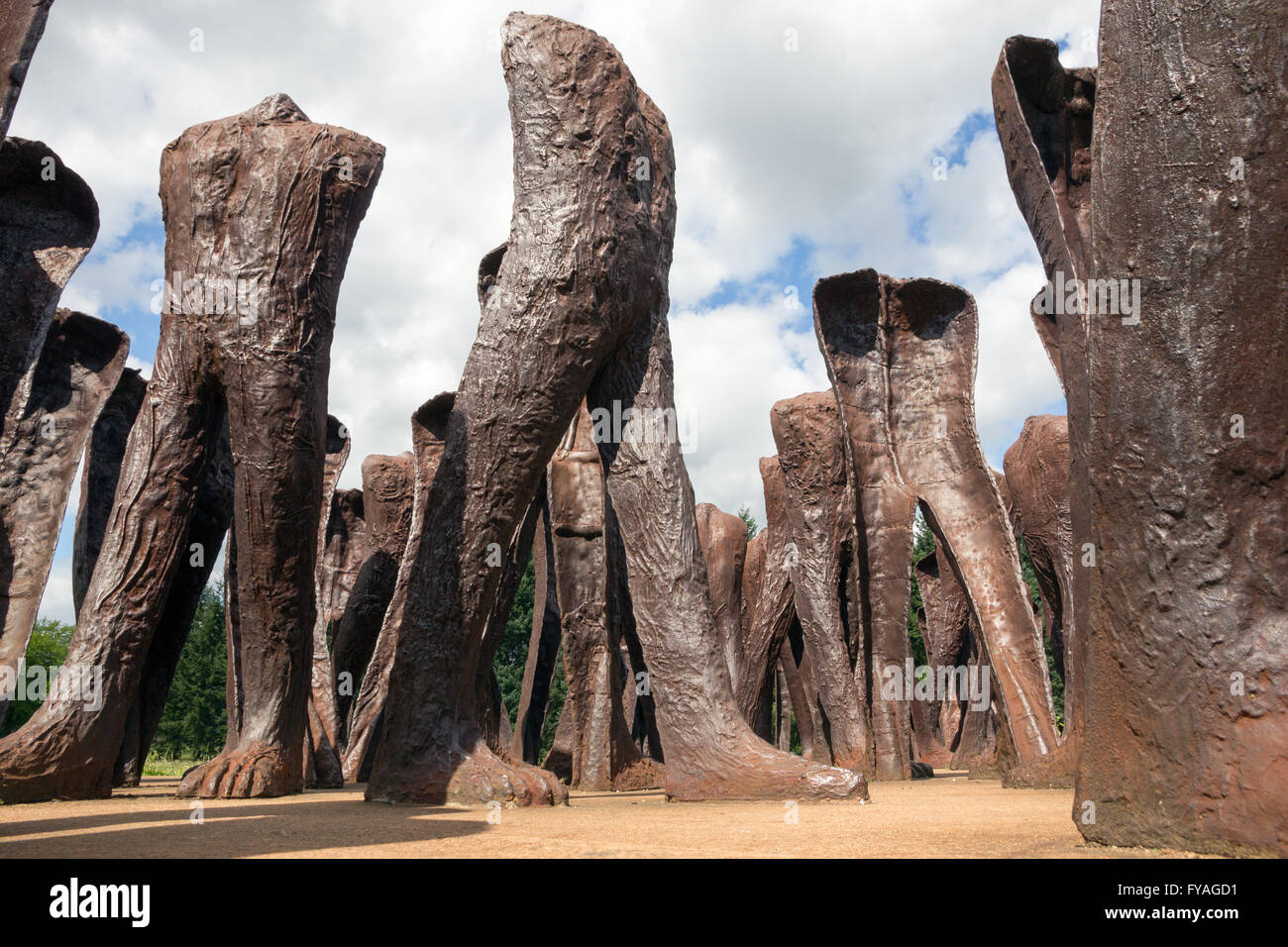 Iron 2 meter tall headless figures marching aimlessly across the Citadel Park in Poznan. The monu Stock Photo