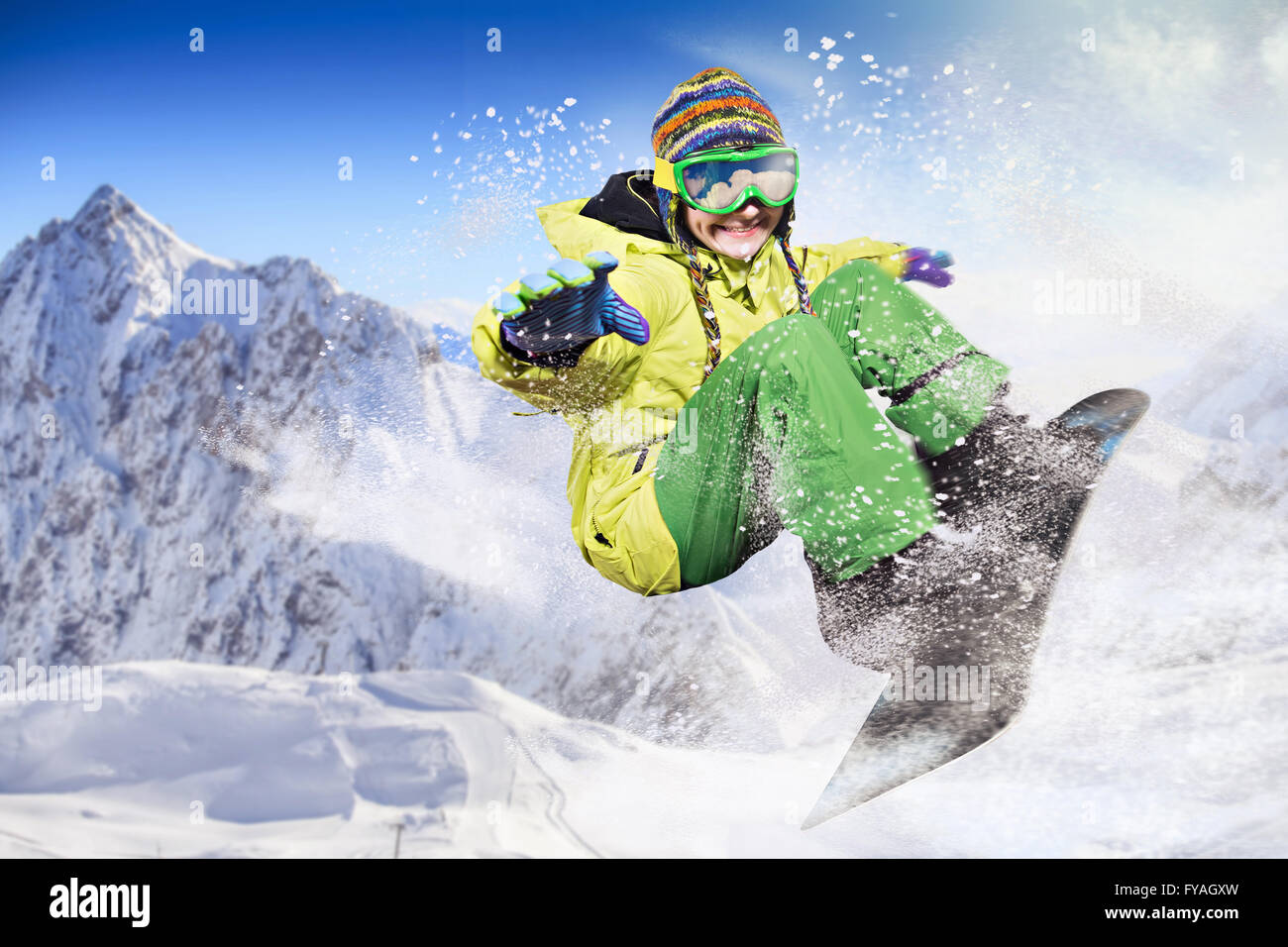 Female snowboarder in mountains hi-res stock photography and images - Alamy