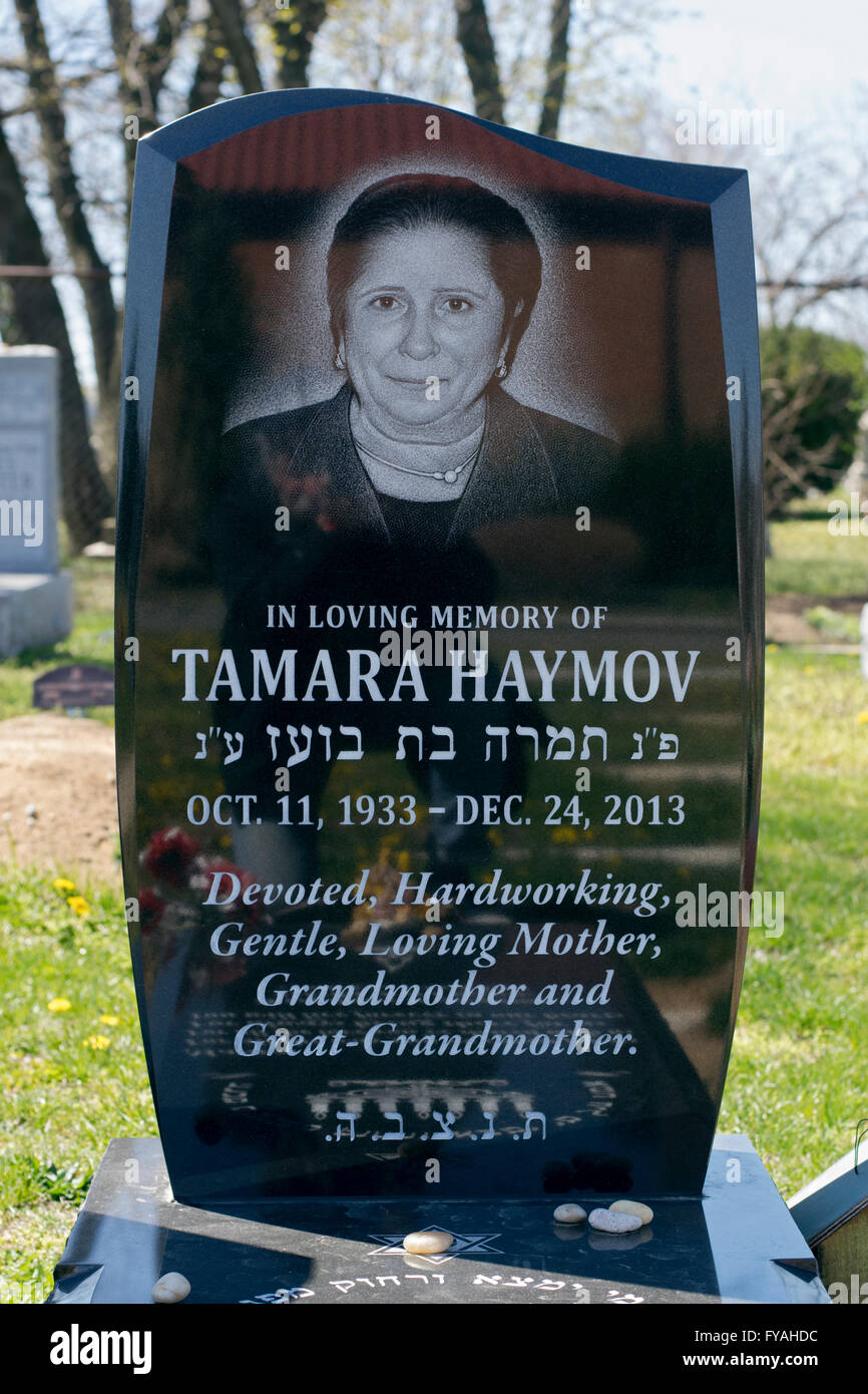 Ornate headstone of a Russian Jewish woman at Montefiore Cemetery in Cambria Heights, Queens, New York Stock Photo