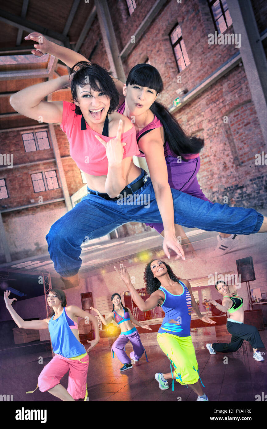 group of women in sport dress dancing zumba or aerobics Stock Photo Alamy
