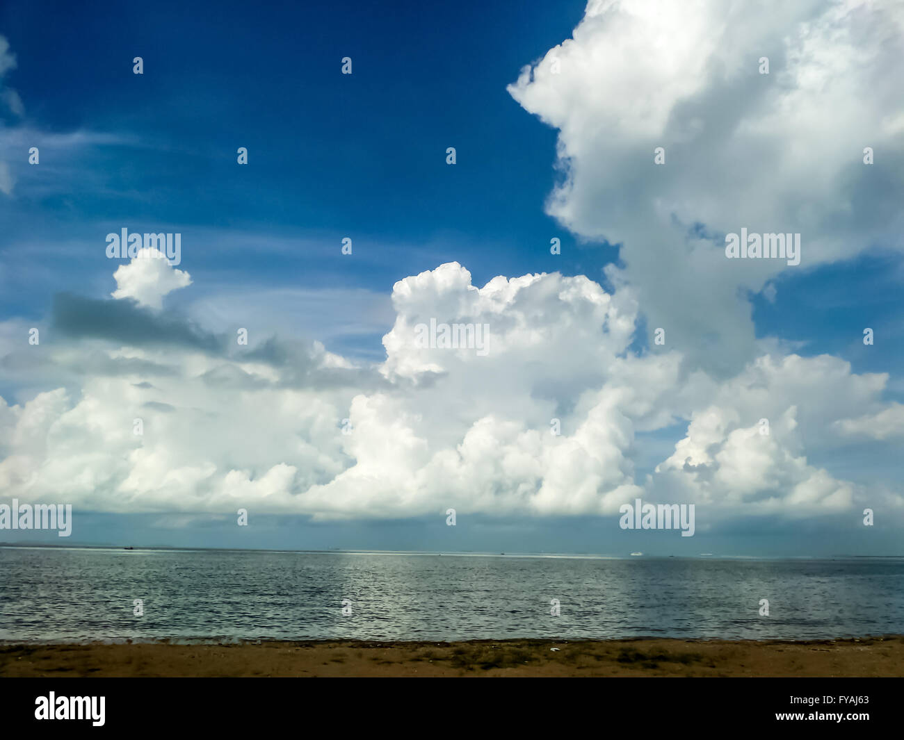 White cloud and the blue sky and sea sand beach Stock Photo - Alamy