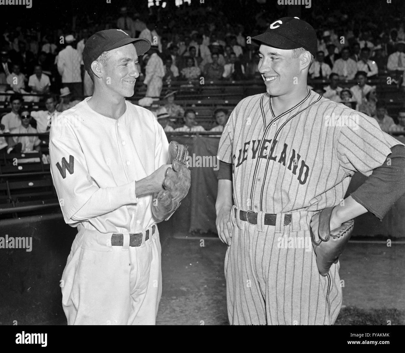 BASEBALL, 1937.  Bucky Jacobs of the Washington Senators and Bob Feller of the Cleveland Indians in Washington D.C. Photograph, 2 August 1937. Stock Photo