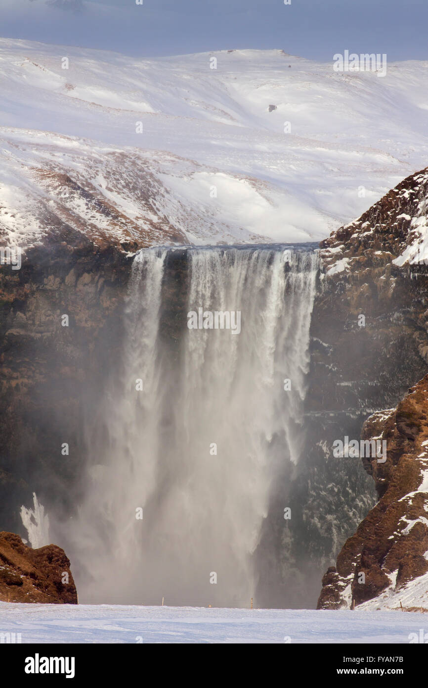 Skogafoss, 63 m high waterfall situated on the Skógá River in winter, Skógar, Iceland Stock Photo
