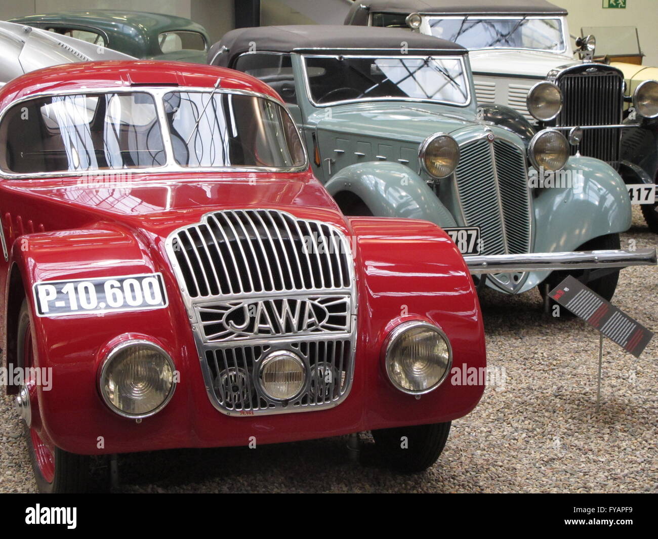 Prague, Czech Republic. Vintage JAWA vehicle with other pre war automobiles at the National Technical Museum Stock Photo