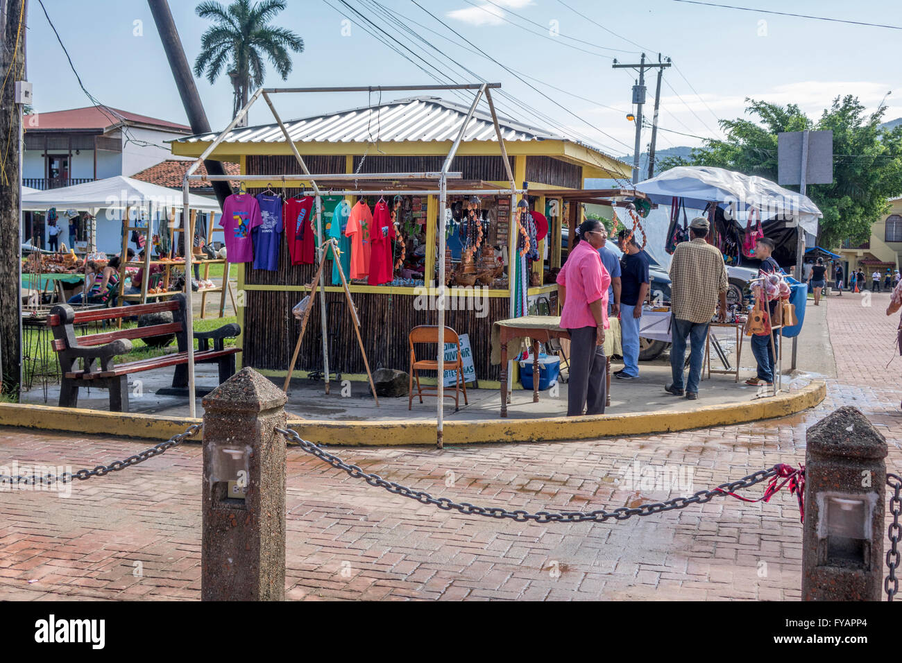 A Woman Stands By Her Souvenir Stall For Tourists Trujillo Honduras, Trujillo Has Just Become A Cruise Ship Stop Stock Photo