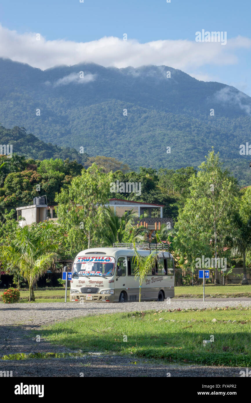 A Tourist Mini Bus Waiting For Cruise Ship Passengers At The Port In Trujillo Honduras, To Take Them On Tour Stock Photo