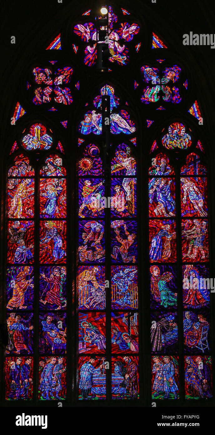 Stained Glass window in St. Vitus Cathedral, Prague, depicting scenes of the Passion of Jesus Christ Stock Photo