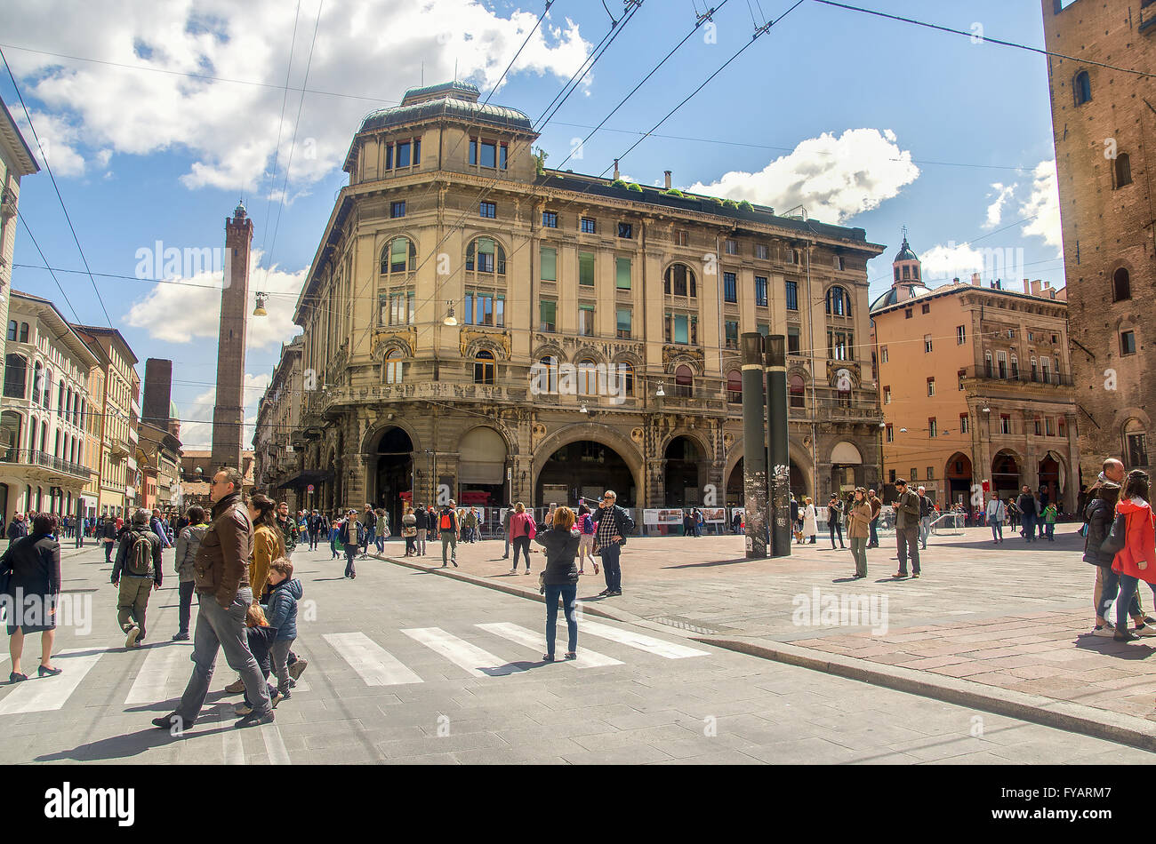 Bologna, Italy, April 25, 2016: via Rizzoli and Piazza Re Enzo full of people walking and take pictures Stock Photo
