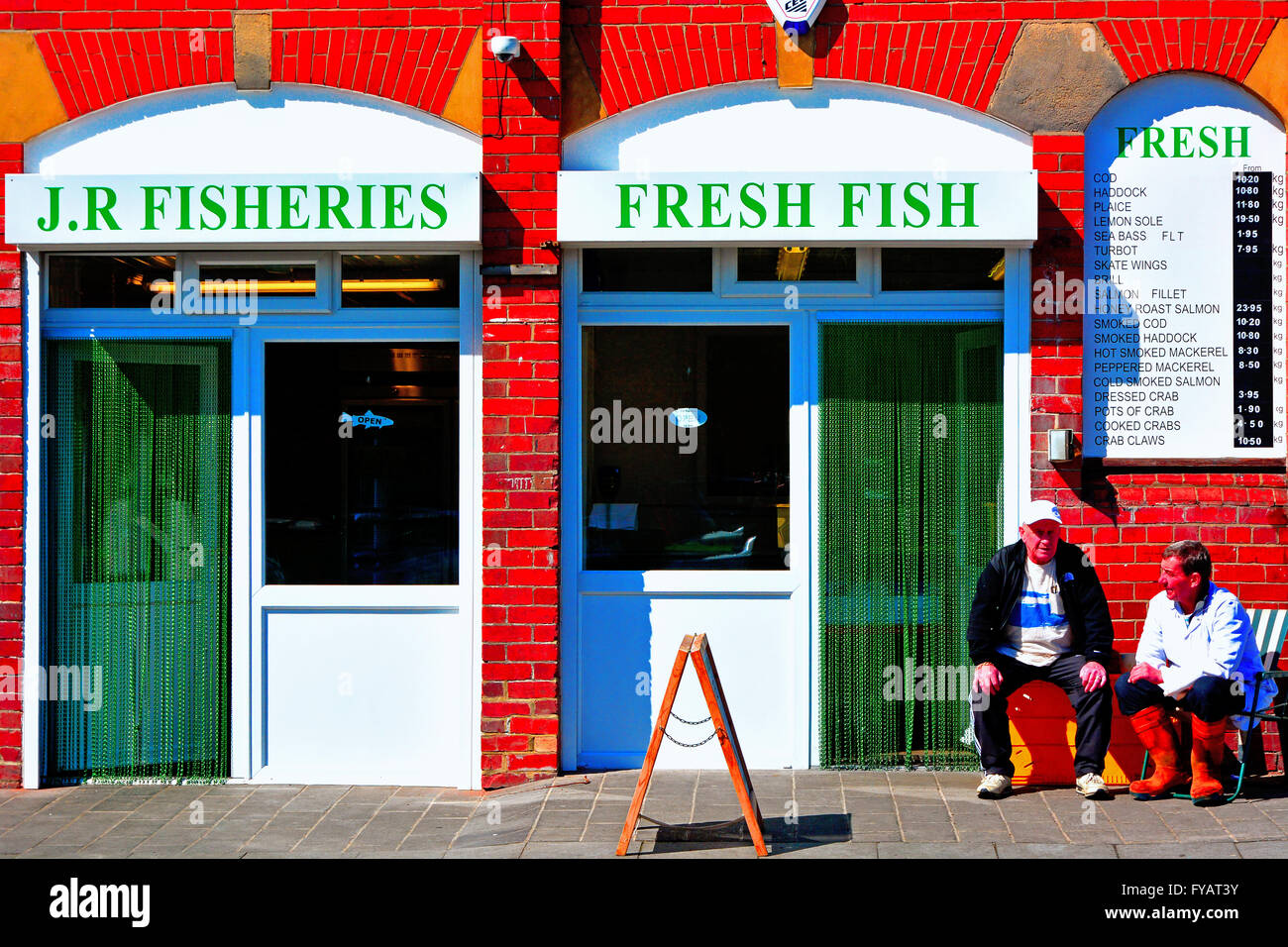 Wet fish shop gutters on fish quay North Shields Stock Photo Alamy