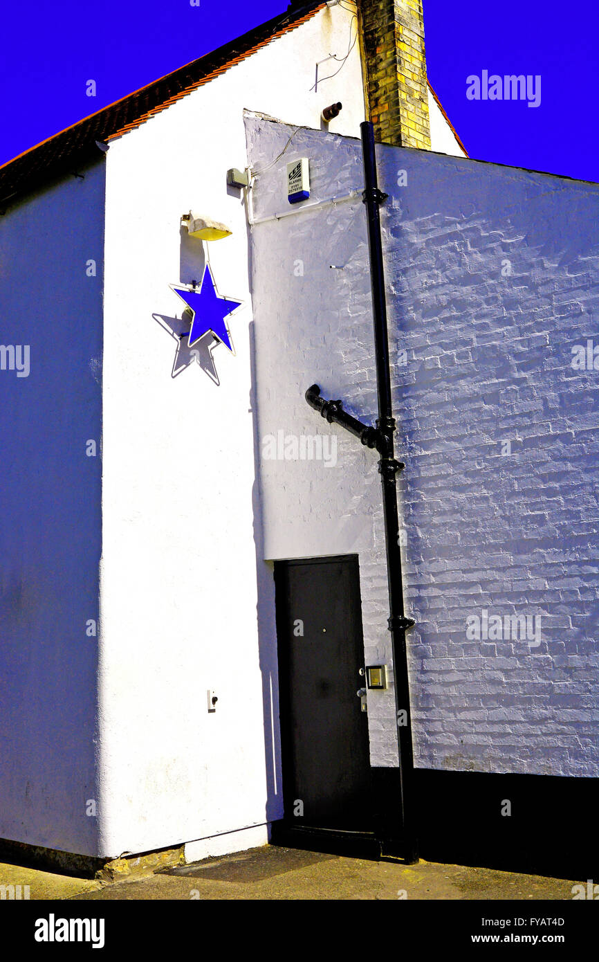 Blue star white walled pub with blue sky North Shields Stock Photo