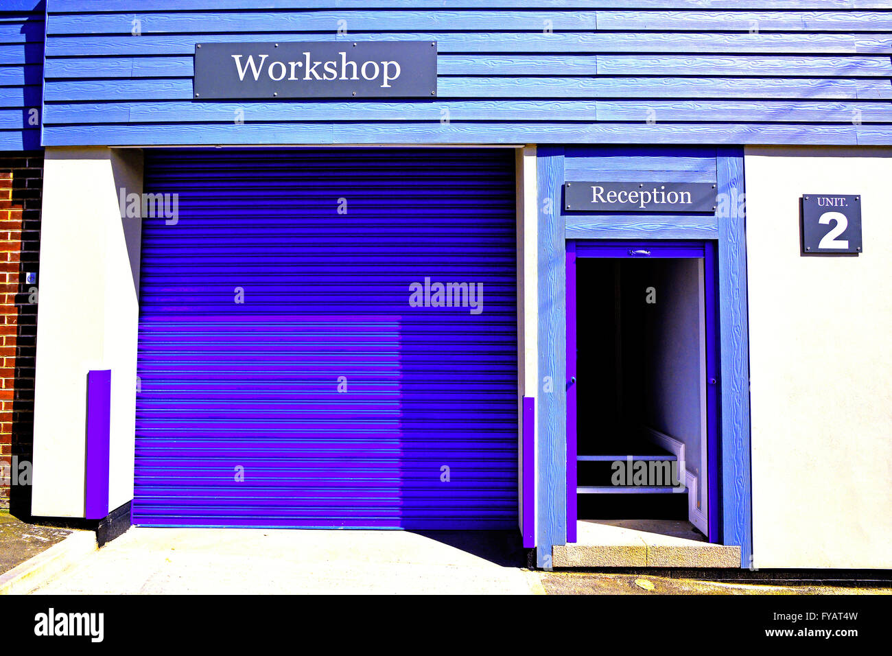 Modern pine panelled blue workshop unit with reception North Shields Stock Photo