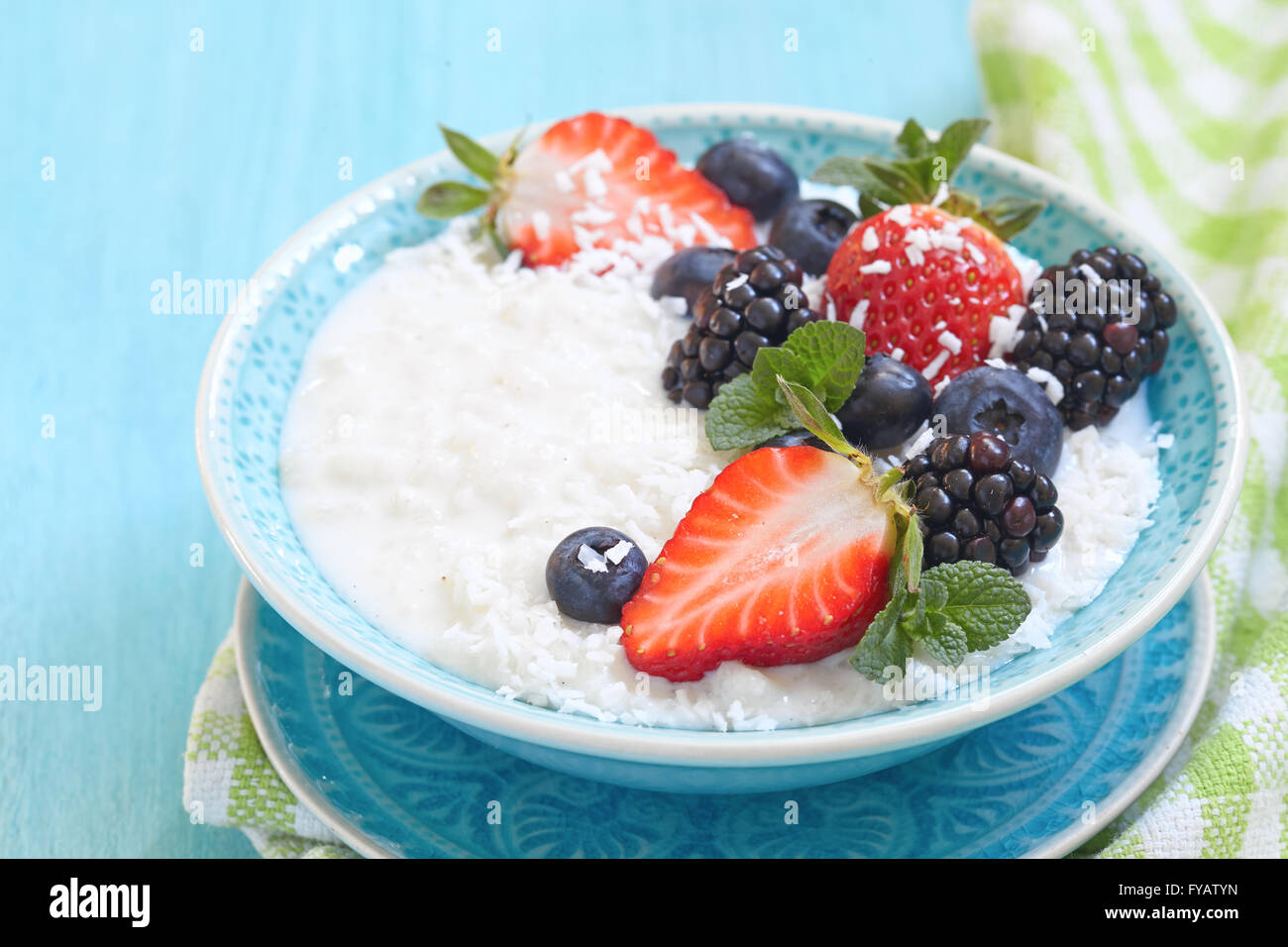 Rice porridge with coconut milk Stock Photo Alamy