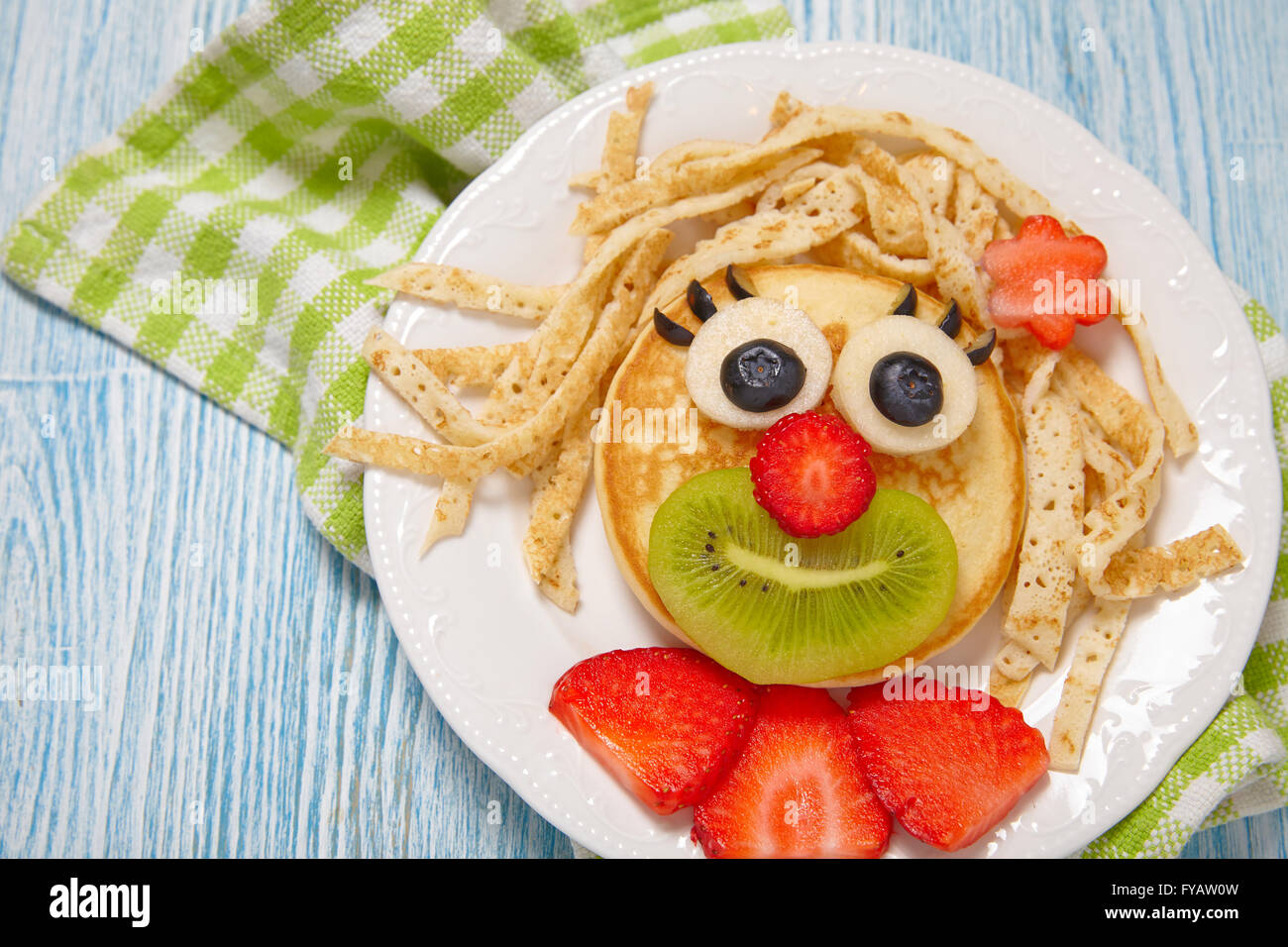 Funny pancake face with fruits and berries Stock Photo Alamy