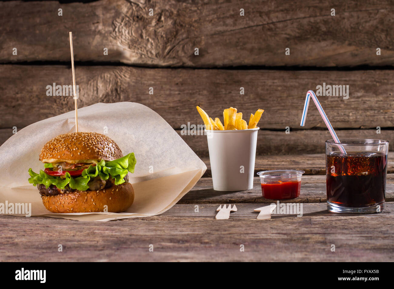 Burger and cola with fries Stock Photo - Alamy