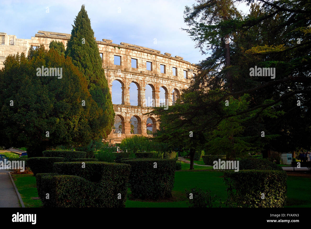 Pula, Istria, Croatia. The Pula Arena is the name of the amphitheatre located in Pula, Croatia. The Arena is the only remaining Roman amphitheatre to have four side towers and with all three Roman architectural orders entirely preserved. It was constructed in 27 BC – 68 AD and is among the six largest surviving Roman arenas in the World. A rare example among the 200 Roman surviving amphitheatres, it is also the best preserved ancient monument in Croatia. The arena is used as a venue for many concerts. Stock Photo