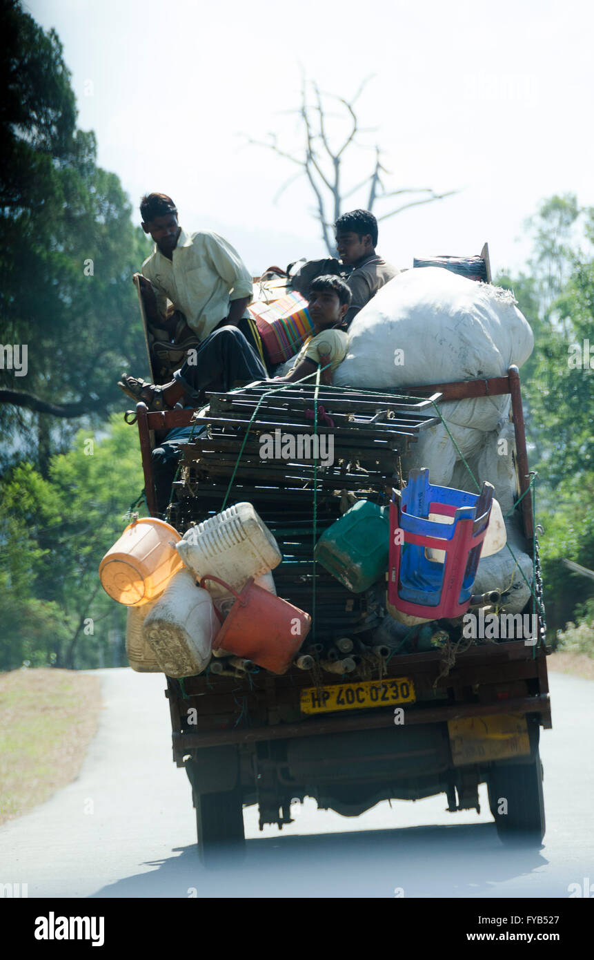 Truck overloaded with plastic containers - Stock Image - C047/7908 -  Science Photo Library