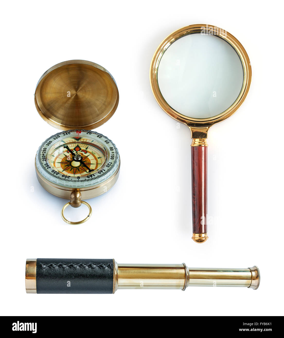 Collection with telescope, compass and magnifying glass isolated on a white background Stock