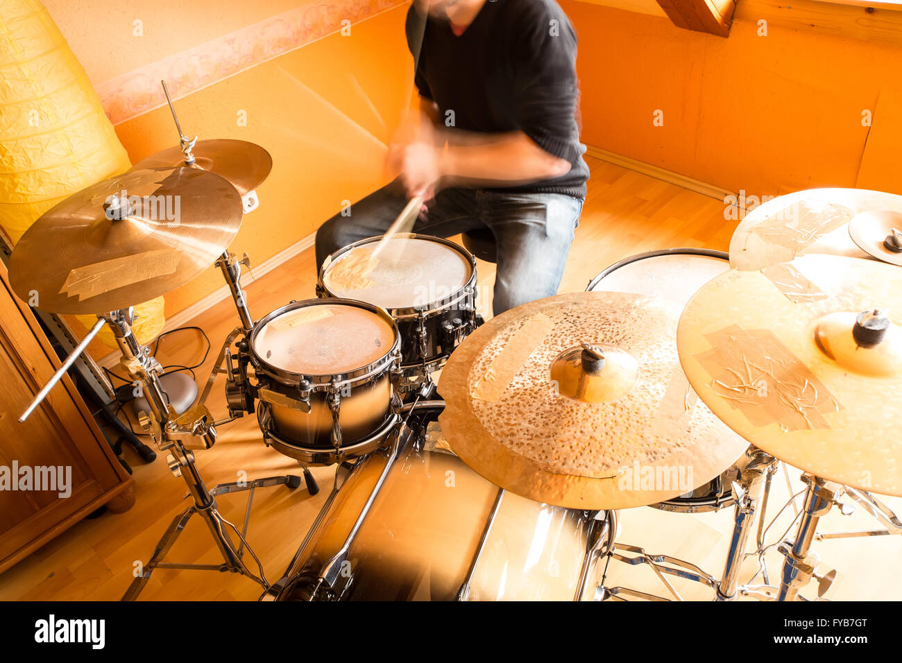 A drummer performing on his Drumset Stock Photo Alamy