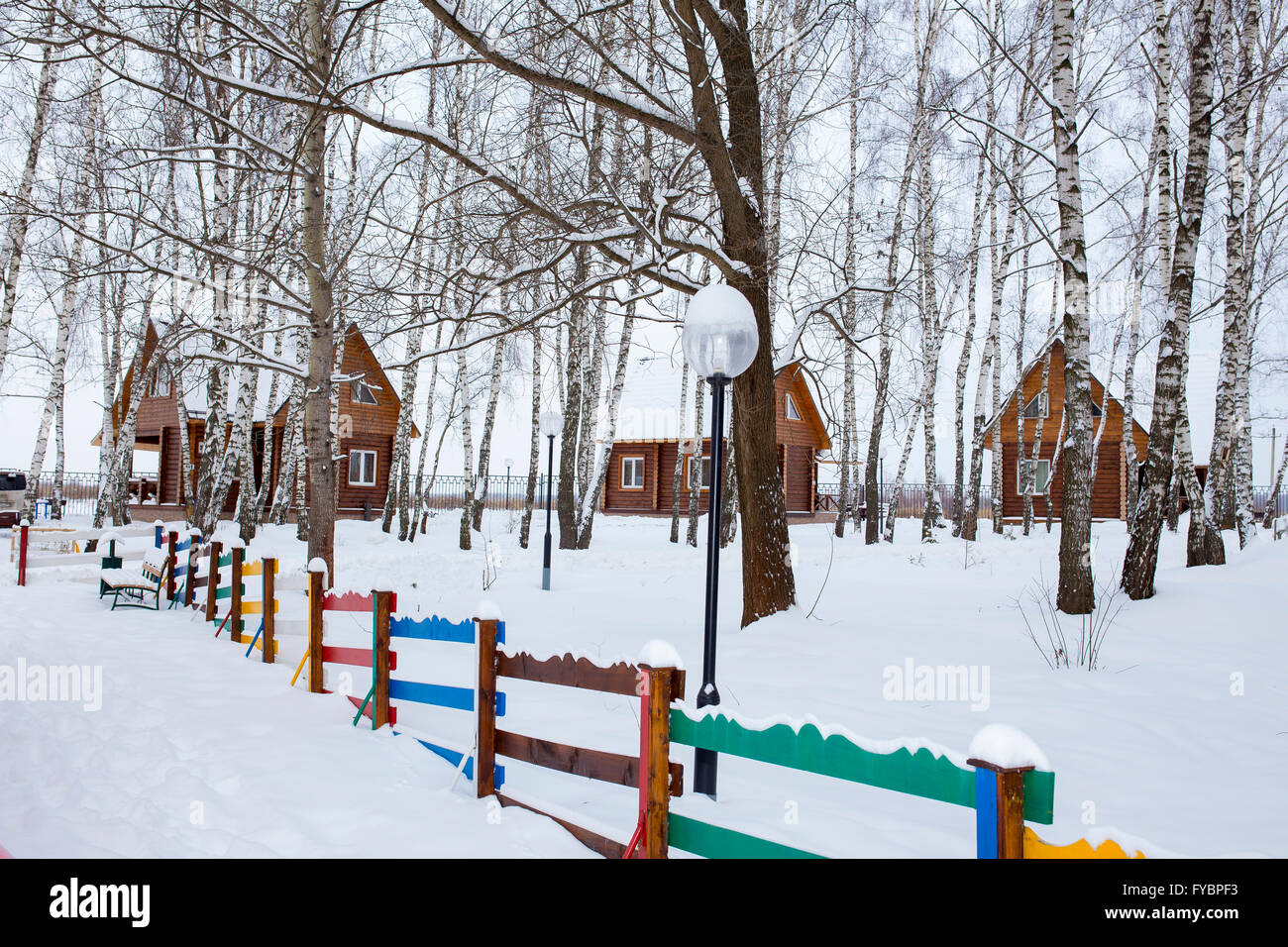 Cozy wooden cabin in snow covered forest in the north of hi-res stock ...