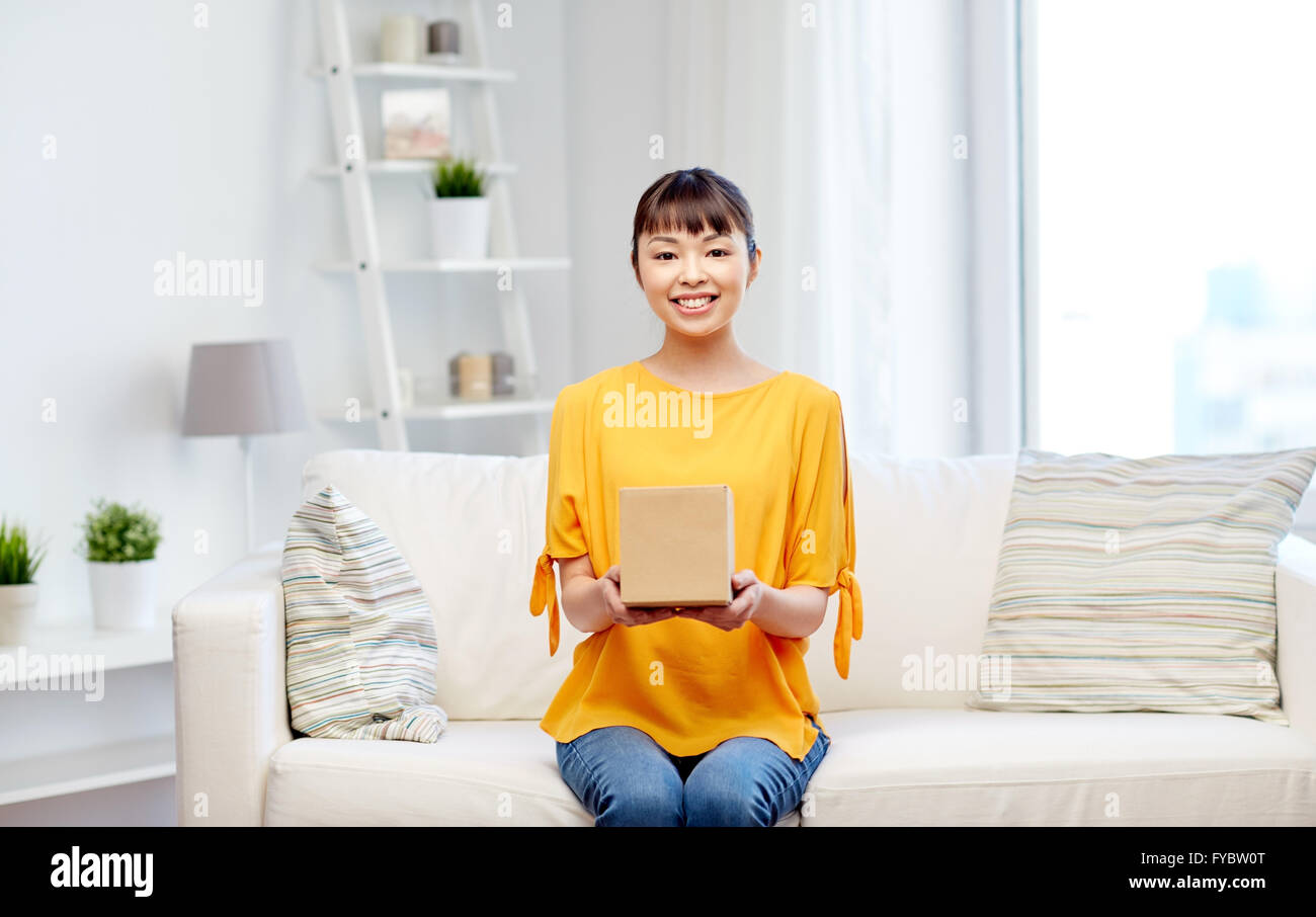 happy asian young woman with parcel box at home Stock Photo - Alamy