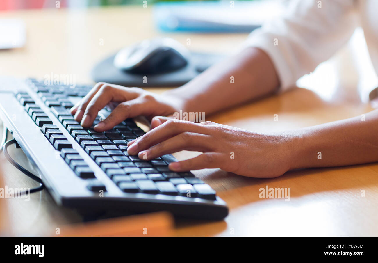 Close up african hands typing hi-res stock photography and images - Alamy