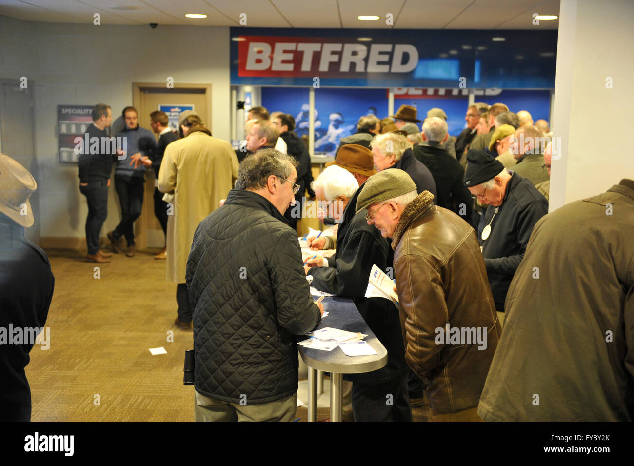 Cheltenham Gold Cup Day 18.03.16 Betting at Betfred on horse racing Stock Photo