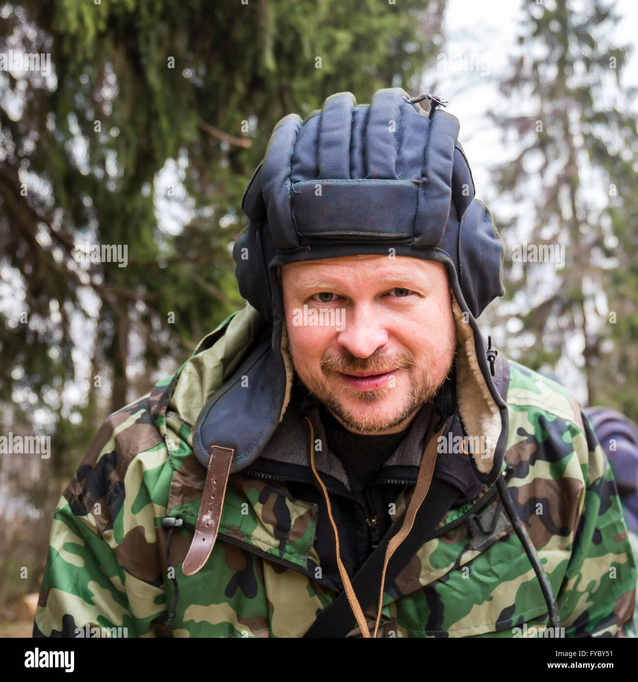 Portrait of a tankman in tank helmet ang camouflage Stock Photo