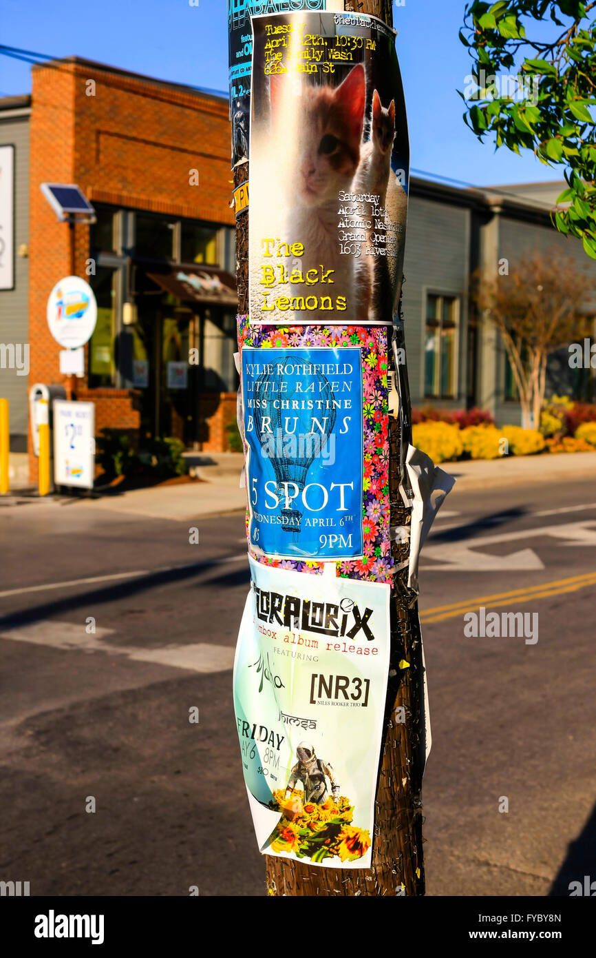 Posters stapled to a power pole in the Five Points District of East