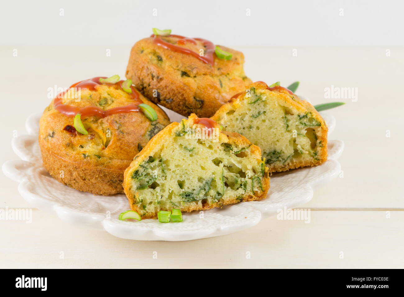 corn bread with spinach  on a white plate Stock Photo