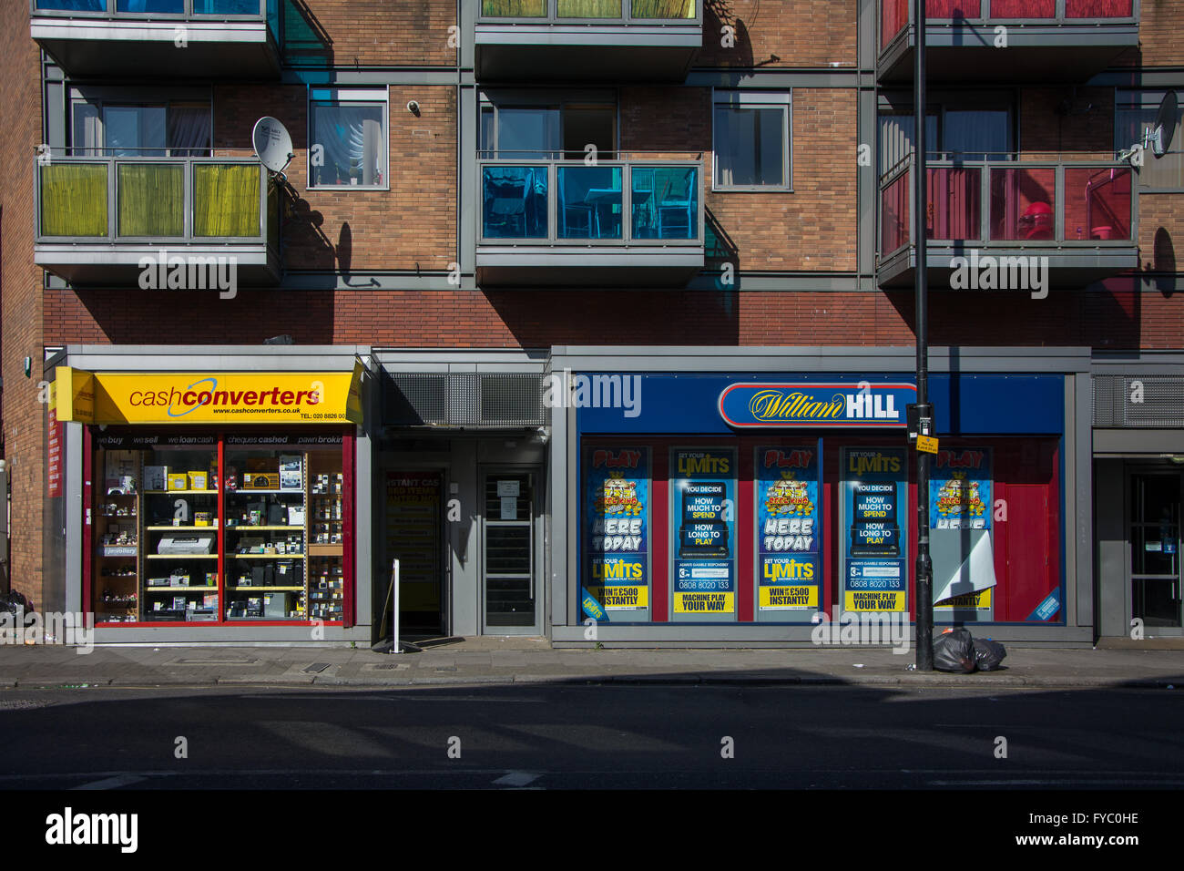 Pawn and betting shop + colourful flats,  Harringay, North London Stock Photo