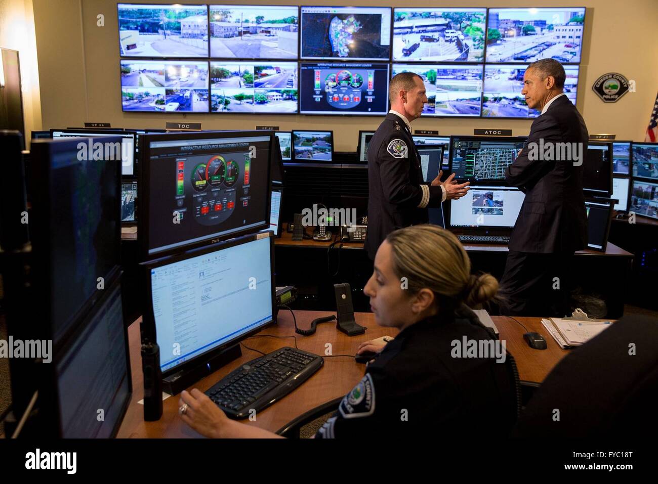 U.S President Barack Obama, with Camden County Metro Police Chief John Scott Thomson during a tour of the Real Time Tactical Operational Intelligence Center at Camden County Police Headquarters May 18, 2015 in Camden, New Jersey. The facility includes technology to monitor crime hot spots, track patrol car position, and view live camera feeds throughout Camden. Stock Photo