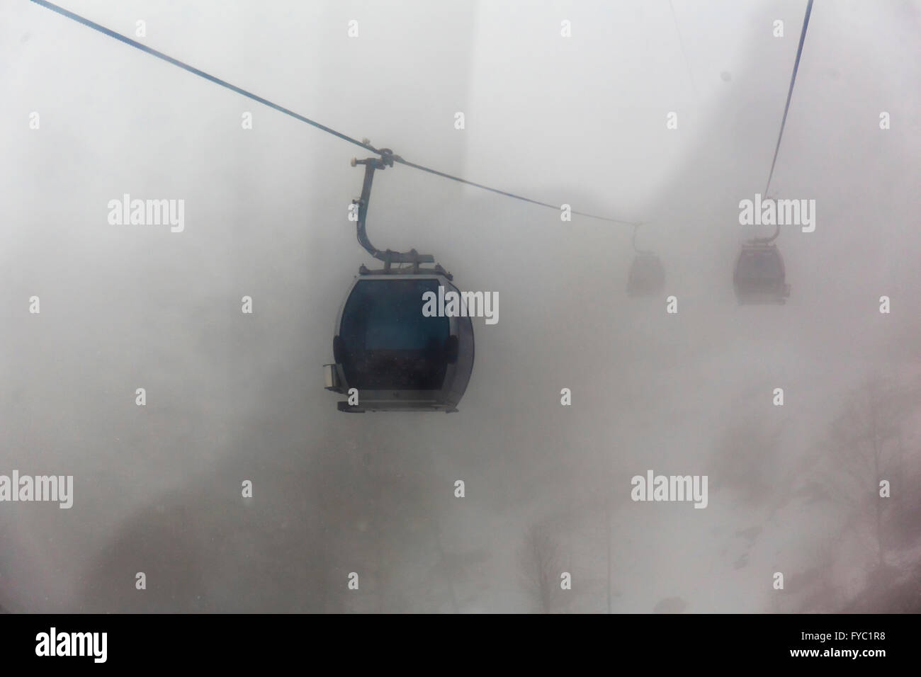 Ski Elevator Cabin In The Mist At Mountains Bad Weather Stock