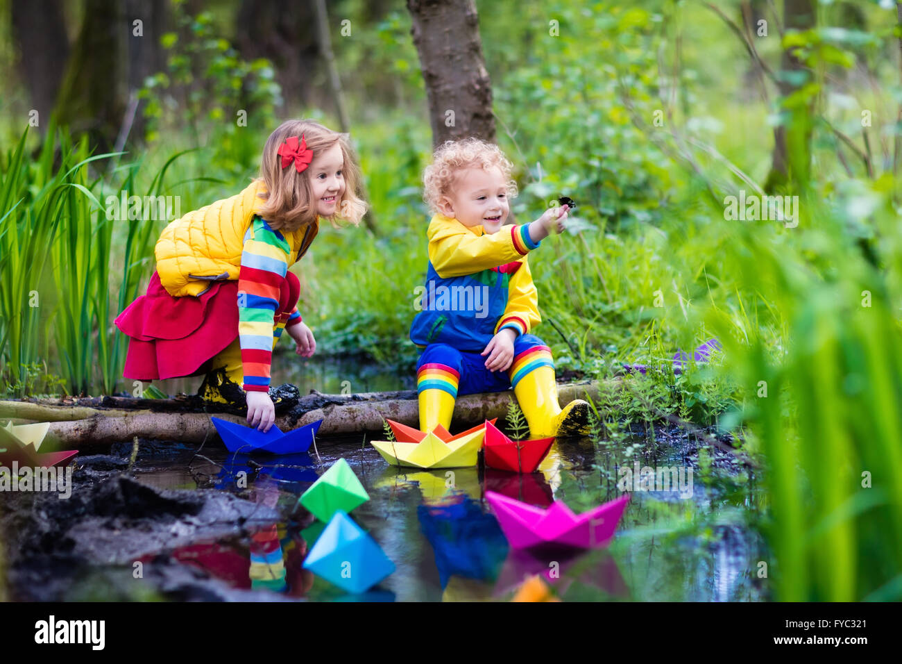 images Nature Spring Pictures For Kids https www alamy com stock photo children play with colorful paper boats in a small river on a sunny 102913385 html